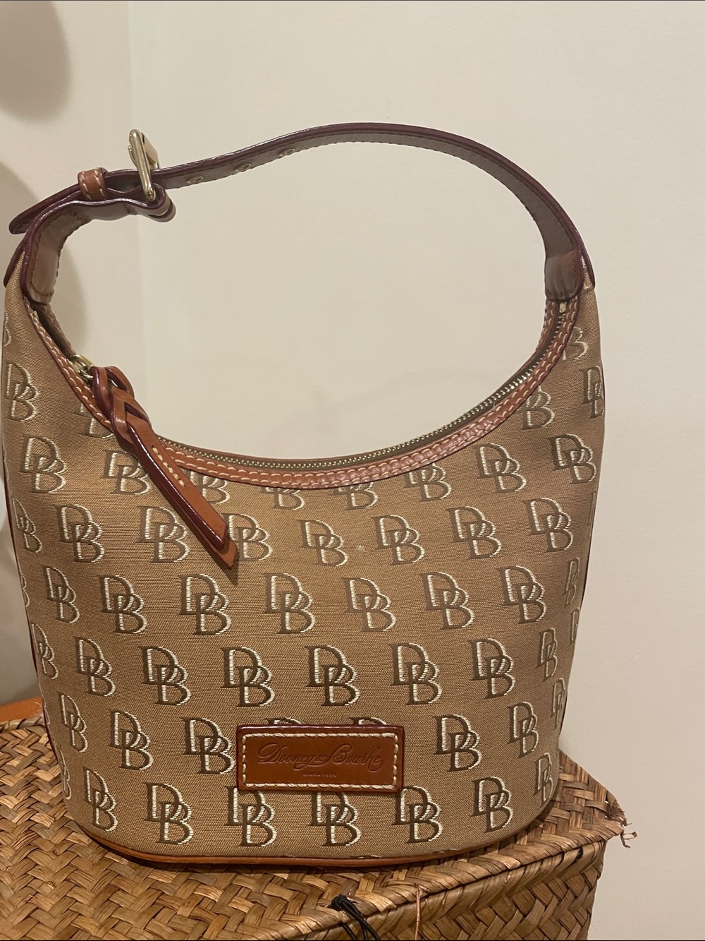 Dooney & Bourke Monogram Bucket Handbag in Tan